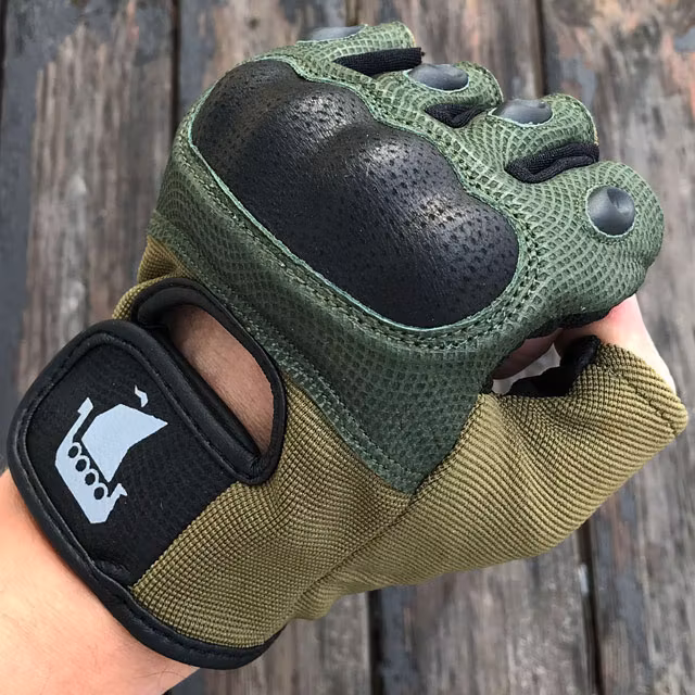 Clenched fist in a Short Finger Tactical Glove Green.