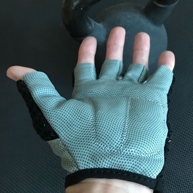 Grey grip friendly palm area of a Training Glove Net Black.