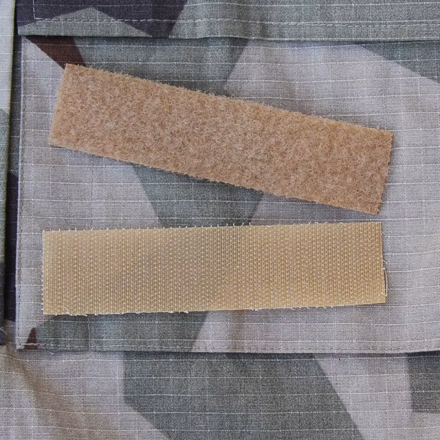 Kardborre Nametag Panel 12x3 Tan with M90K Desert camouflage in the background.