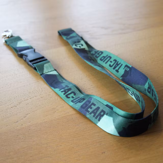 Our popular M90 Neck Lanyard during product photoshoot laying on the floor.
