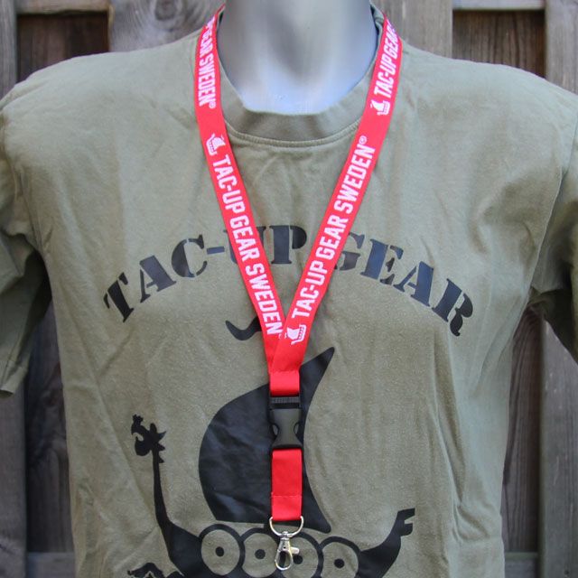 Worn on the neck on a mannequin is the Lanyard Red/White.