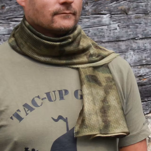 Casual wearing a Sniper Scarf Marshland draped around the neck.