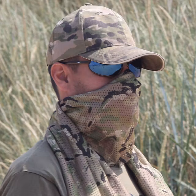 A Mesh Scarf Multicam used as face veil