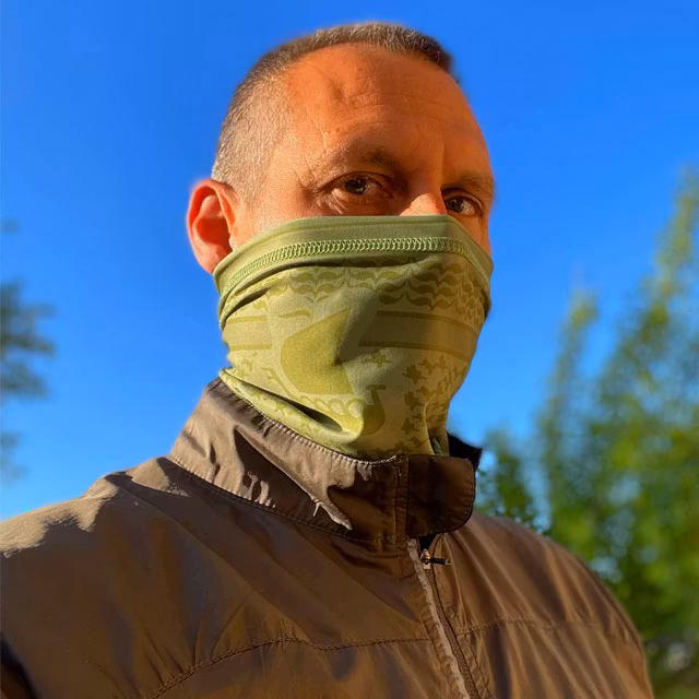 A Neck Tube Shemagh Lime Green from TAC-UP GEAR worn around nose and mouth on a model