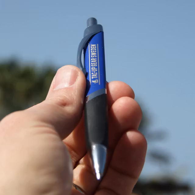 Holding a Office Pen Navy Blue.