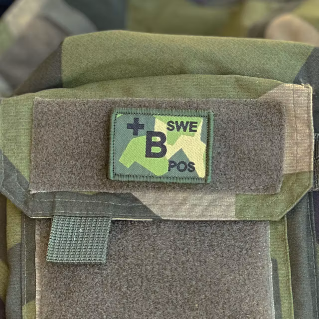 B-POS Blood Type Hook Patch M90 patch from TAC-UP GEAR on a NCWR Jacket M90 sleevepocket