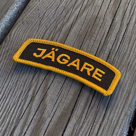 JÄGARE Sew-On Patch Orange / Black