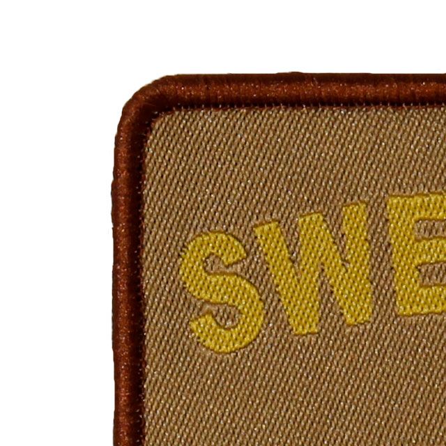 Close up of a SWE MEDIC Desert Star Hook Patch.