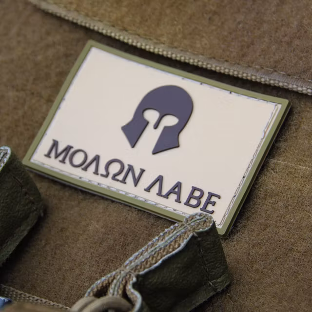 Molon Labe Multi Tan PVC Patch on a combat vest.