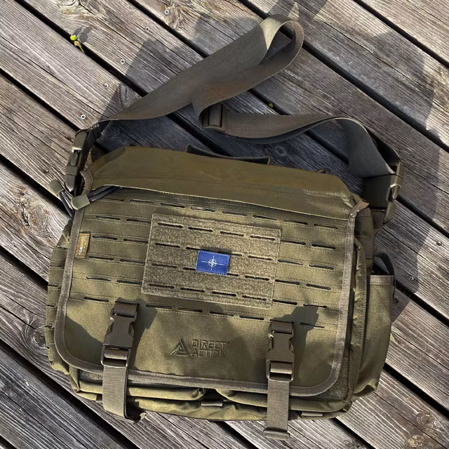 NATO Flag Hook Patch Small from TAC-UP GEAR mounted on a messenger bag