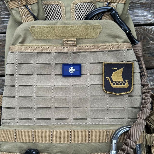 A NATO Flag PVC Hook Patch Small from TAC-UP GEAR seen with Viking Logo patch