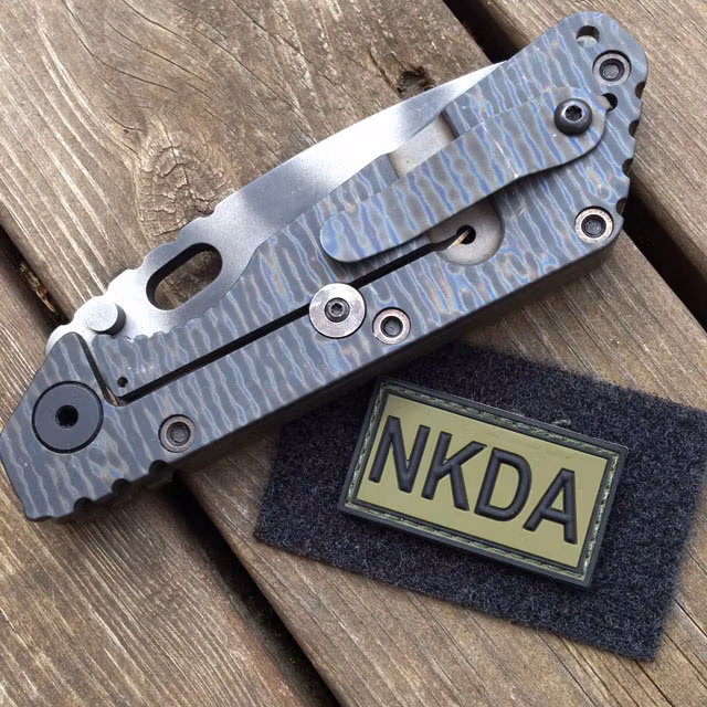 Strider knife and a NKDA Green/Black PVC Hook Patch.