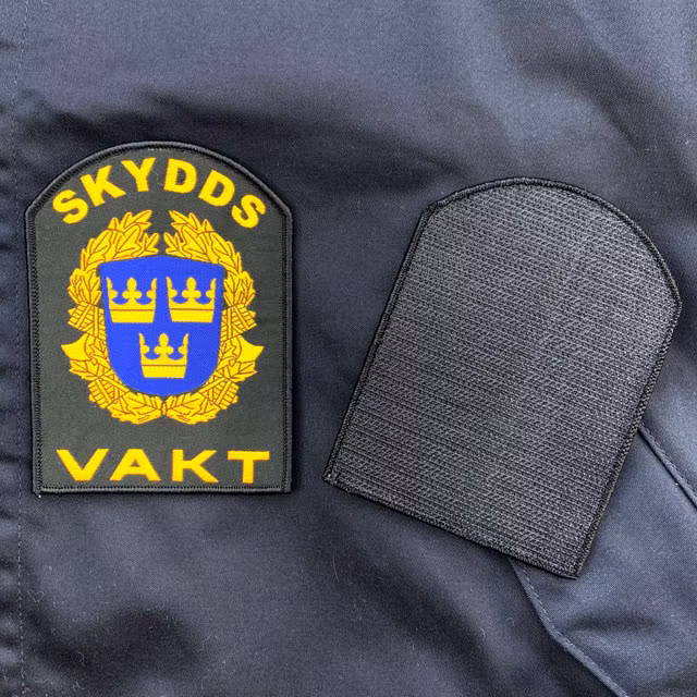 Skyddsvakt Rundad Kardborremärke visar också baksida