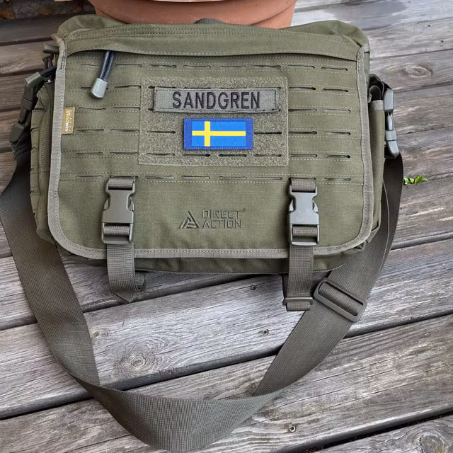 A Sweden Long Flag Blue from TAC-UP GEAR on a messenger bag