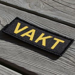 VAKT Kardborremärke