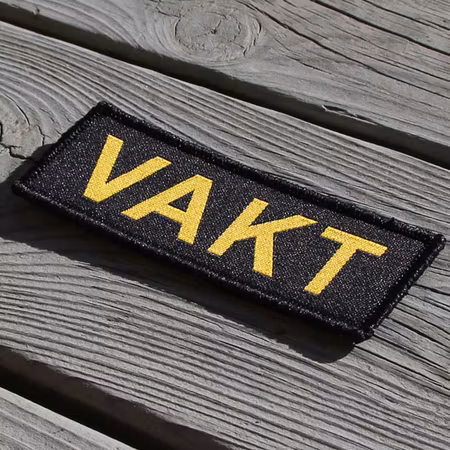 VAKT Bröstmärke med Kardborre – Gul