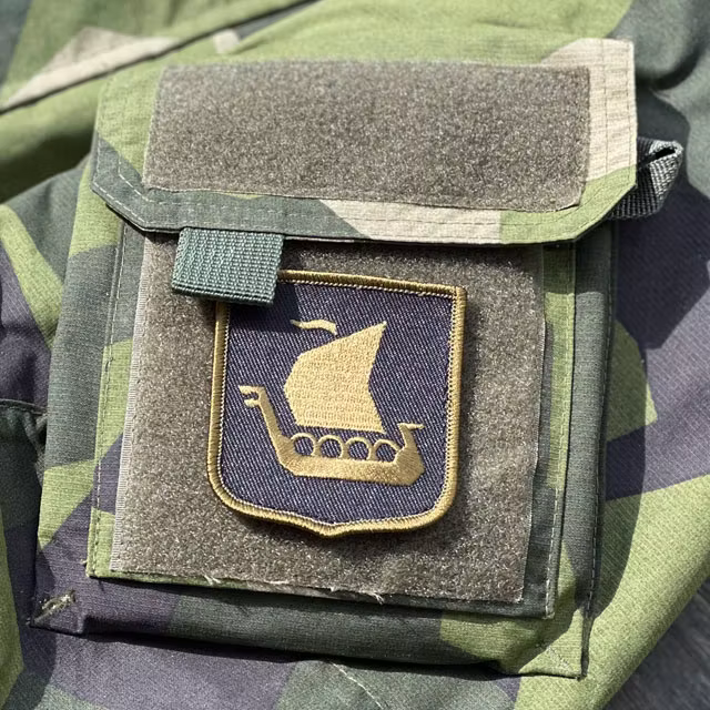 Viking Ship Shield Large Olive and Black Hook Patch on a NCWR Jacket M90