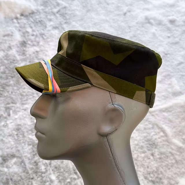 Rubber bands on the peak on a Patrol Cap M90 from TAC-UP GEAR