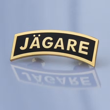 JÄGARE Lapel Pin Gold/Black
