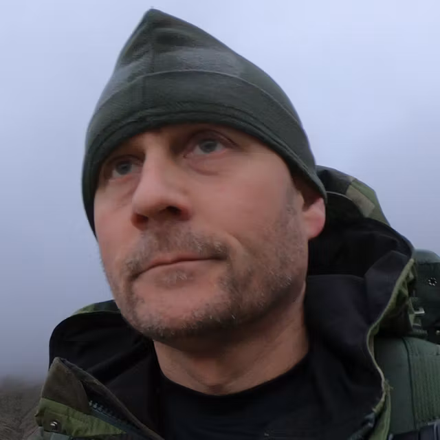 A Recce Fleece Cap seen with frost on suring endurance race on Pen y Fan