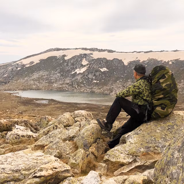 Rucksack Cover M90 mounted on backpack during mountain hike