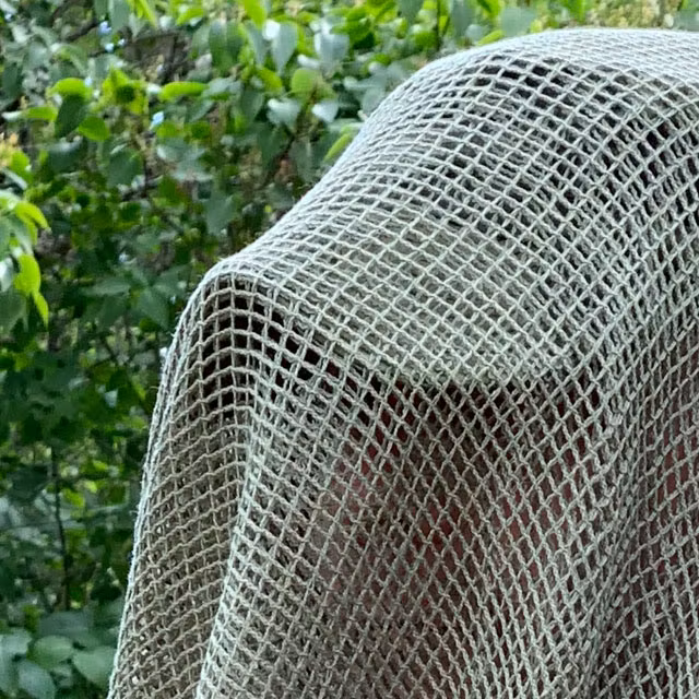 Closeup look on a Scrim Net Scarf Green