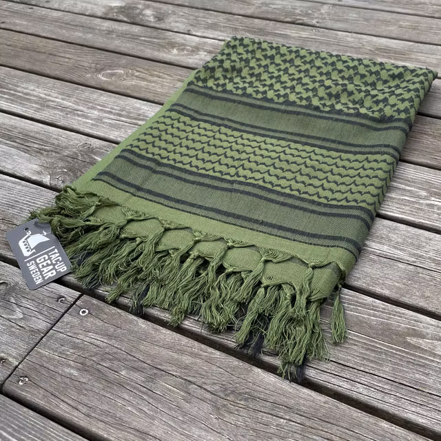 A folded Shemagh Green/Black from TAC-UP GEAR