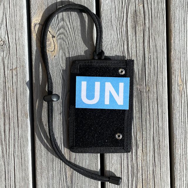 A large United Nations patch attached on a Tactical Neck ID Card Holder Black from TAC-UP GEAR