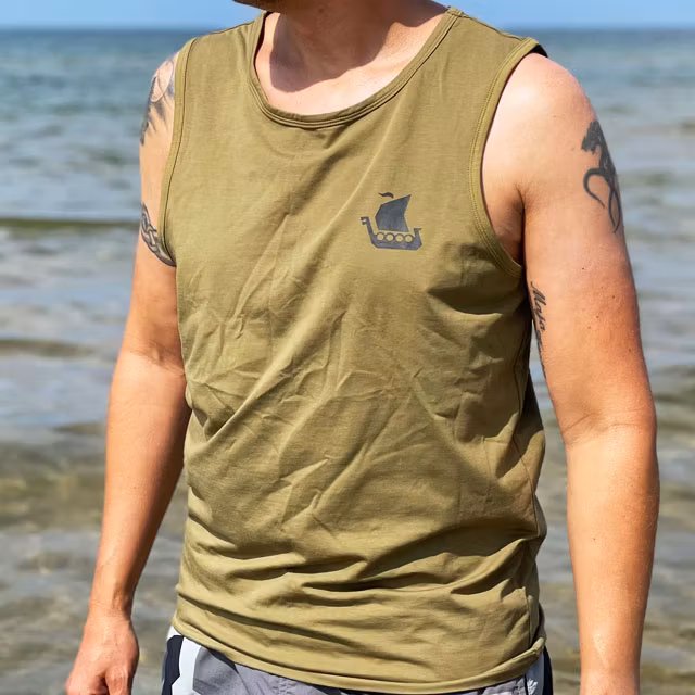 Tank Top Khaki Green from TAC-UP GEAR on model at the ocean seen from an angle of the front
