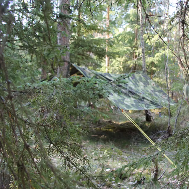 Using a Tarp M90 Light to create a small camp and are instantly difficult to spot