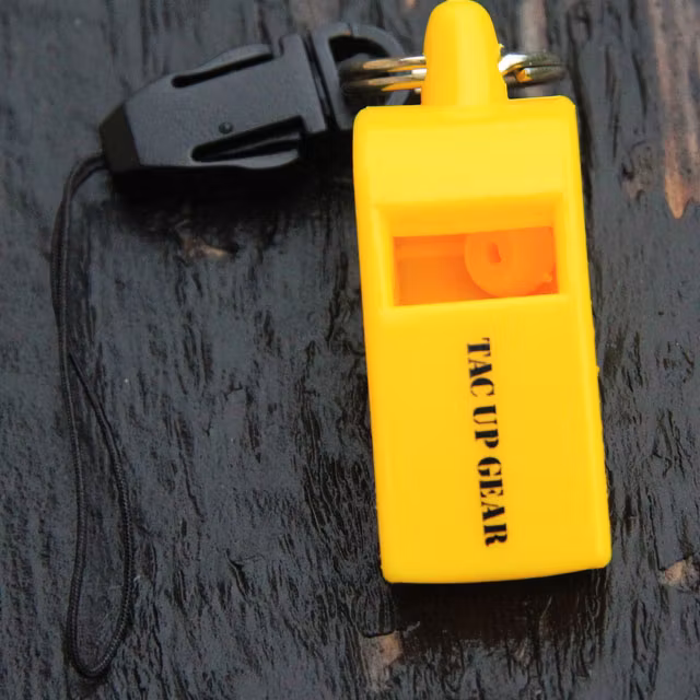 A product picture Whistle H.E.L.P with logo text.