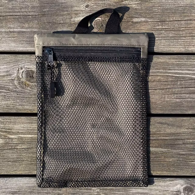 The backside of a Zipper Net Pouch Khaki from TAC-UP GEAR
