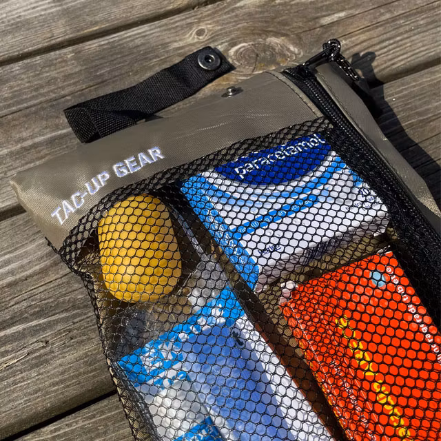 Snap button on a Zipper Net Pouch Khaki from TAC-UP GEAR