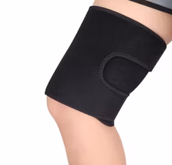 Kompressiolla varustettu reisisuoja, säädettävä