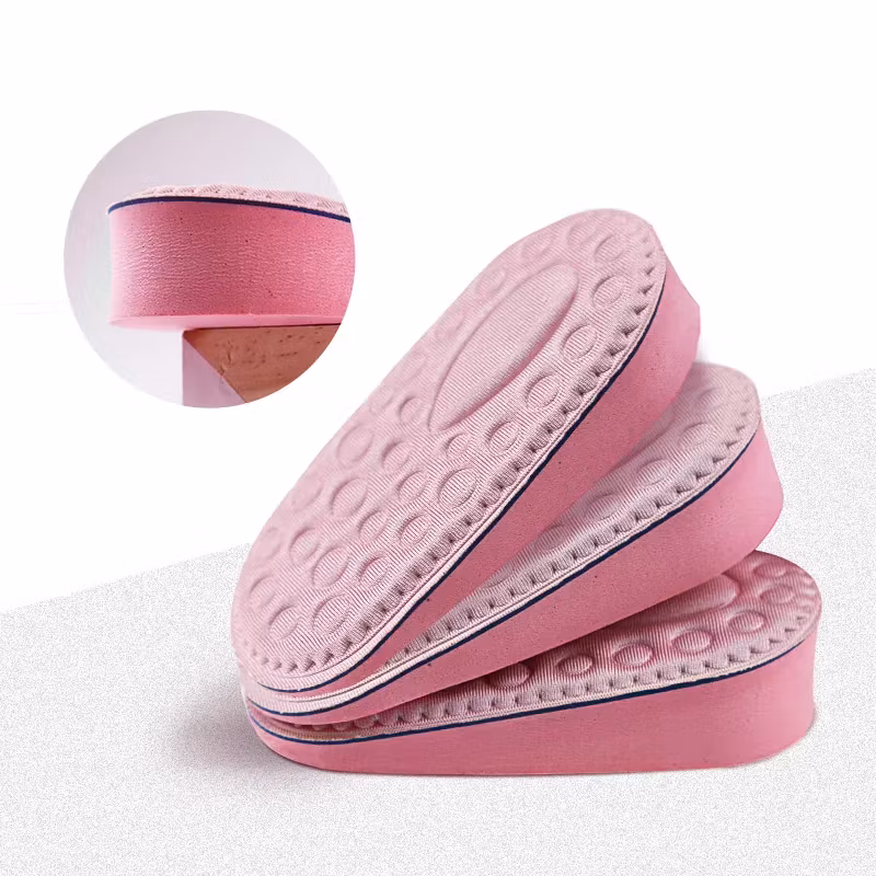 Kantapään pohjalliset lisäpituutta varten pinkki