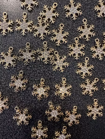 BERLOCK FINASTE SNÖSTJÄRNAN GULD