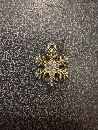 BERLOCK FINASTE SNÖSTJÄRNAN GULD