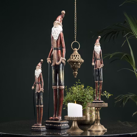 Tomte med käpp