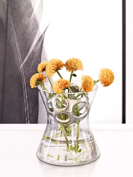 Blomsterfördelare till vas