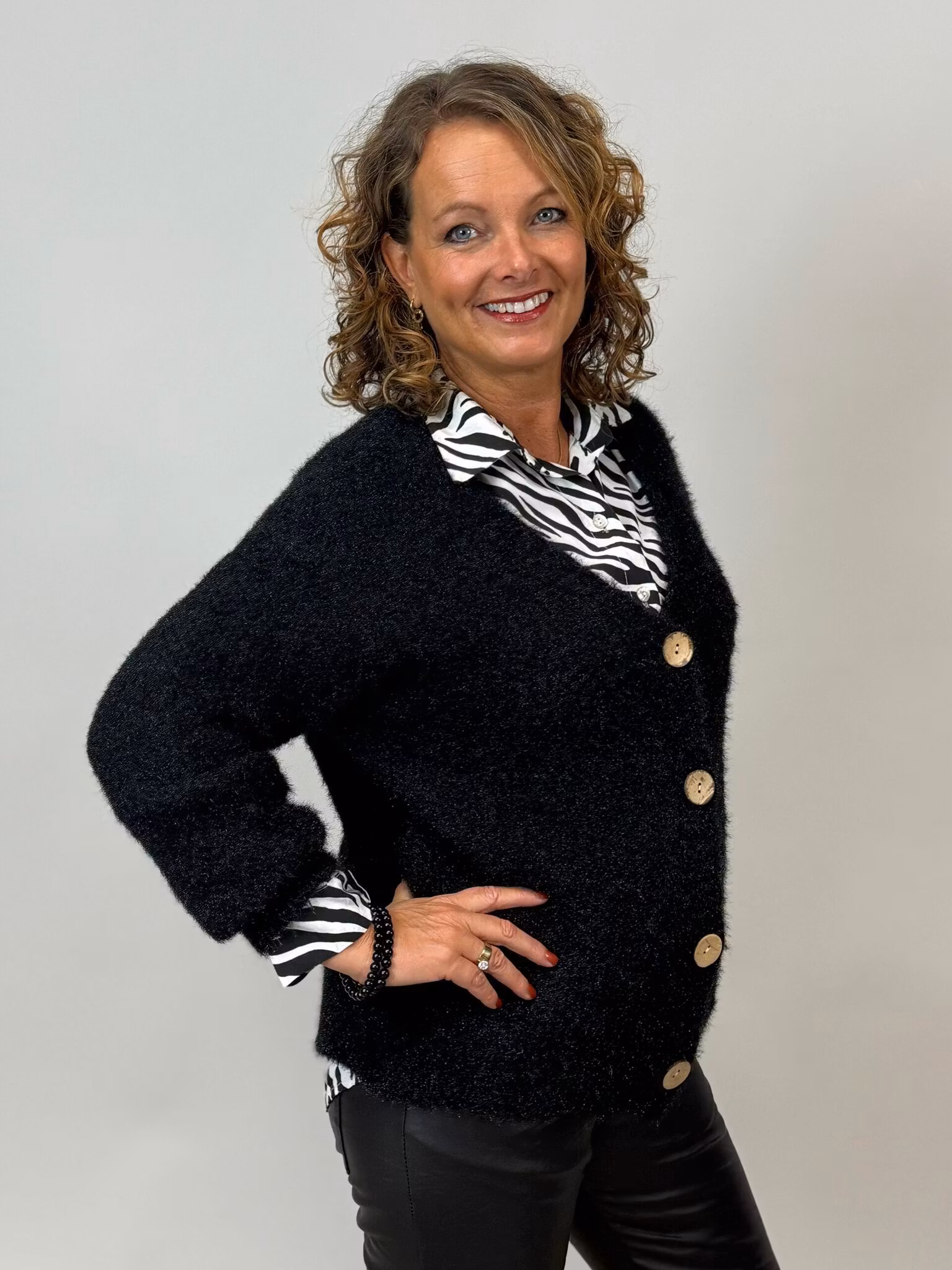 Stickad kofta - svart