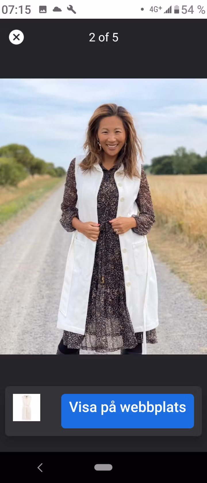 Lång väst i fuskmocka - svart