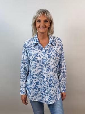 Blus med knyt i sidan - blå