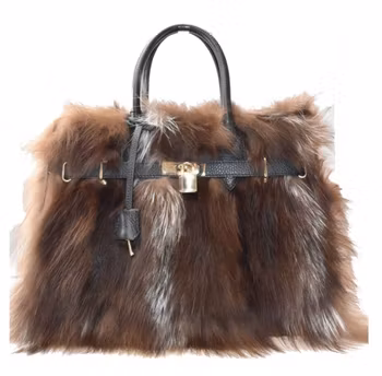 Esklusiv håndveske i skinn og fluffy pels