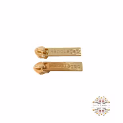 Glidere med teksten Håndlaget