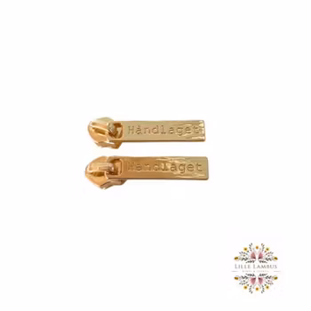 Glidere med teksten Håndlaget