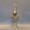 Fotogenlampa i glas med Lotusbrännare