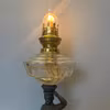 Bordsfotogenlampa på figurinfot 1870-tal 10'''