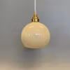 Halvklotslampa vaniljgul 14 cm