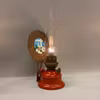 Liten patinerad fotogenlampa i plåt 6'''
