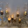 Fotogenlampa i glas med Lotusbrännare
